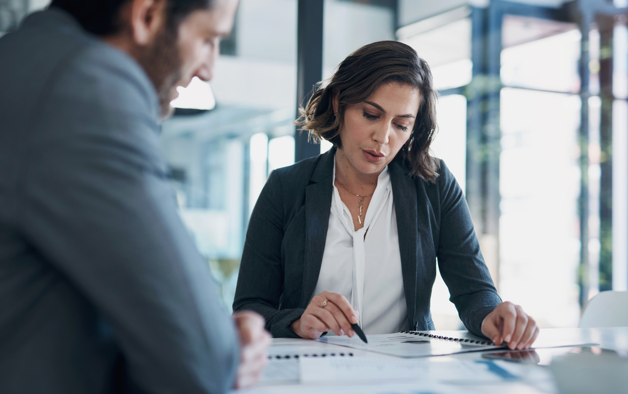 A  financial advisor helping a client