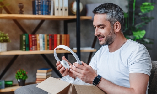 A person opening a package