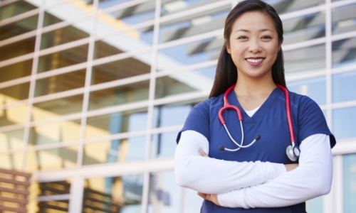 A nurse standing in a clinic