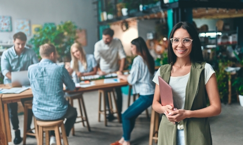 A group of young employees collaborating at work