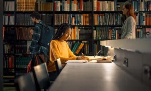 High school students studying in a library