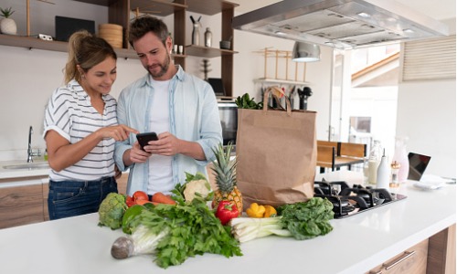 Couple Shopping for Groceries Online