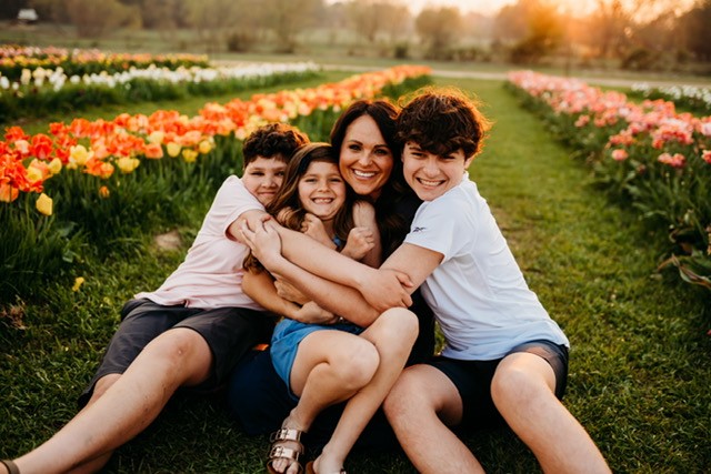 Brandi sitting with her kids