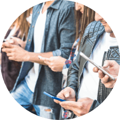 group of people reading phones