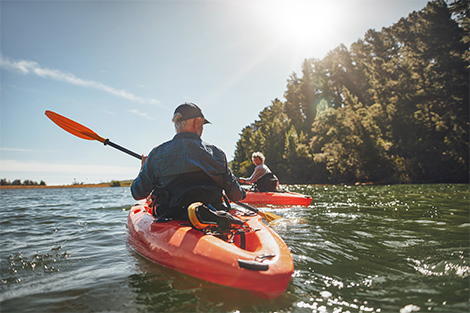 retired couple kayaking together